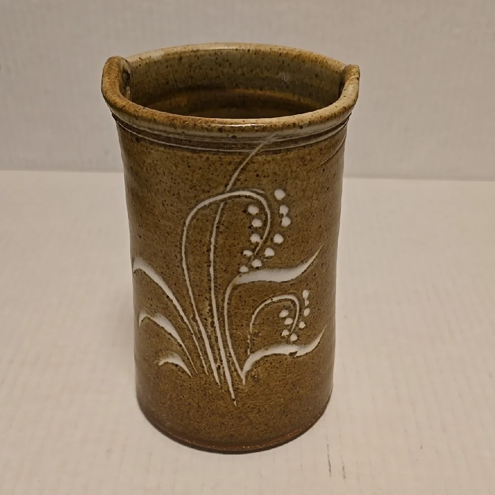Brown Signed Pottery Vase with White Floral Design